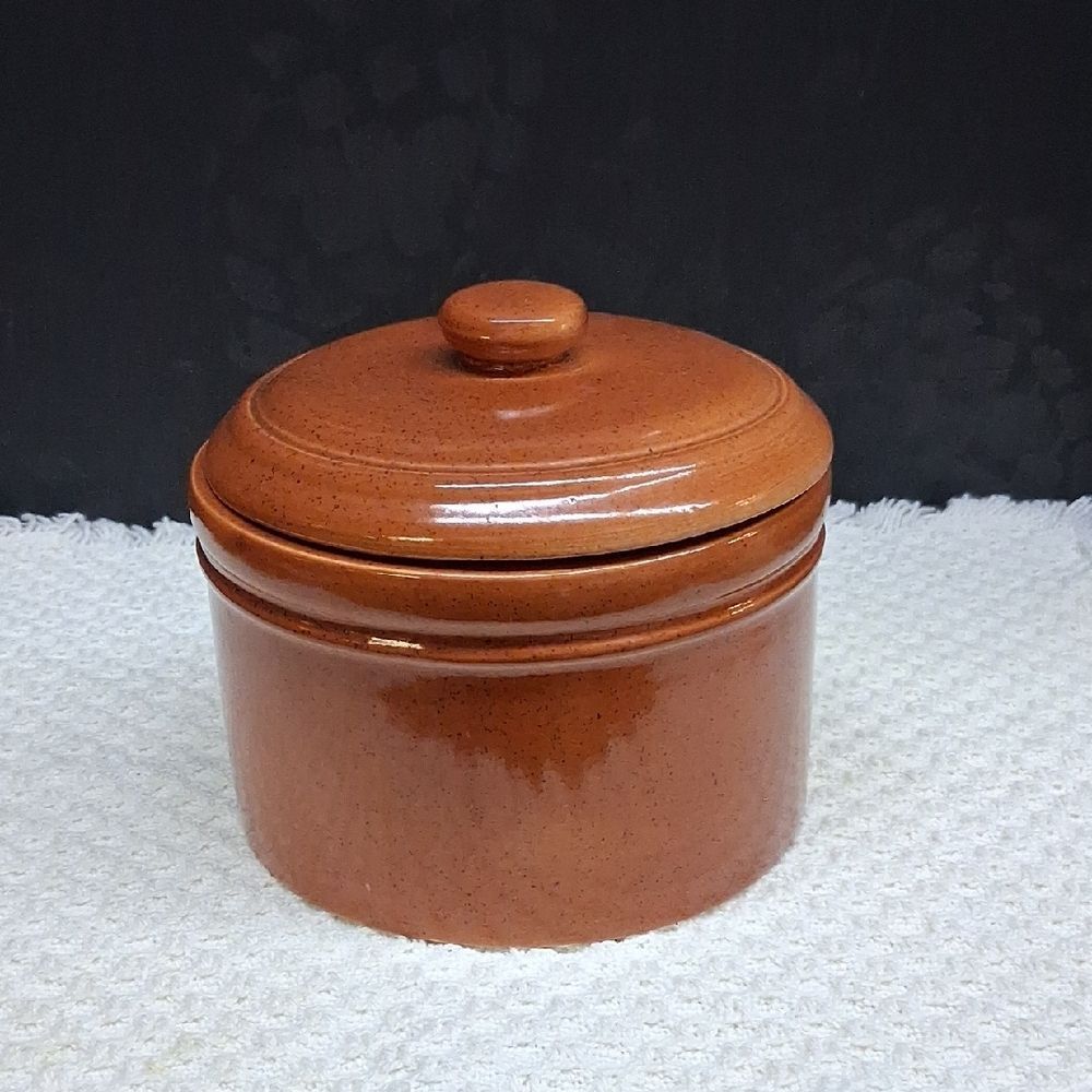Vintage pottery crock bowl with lid with brown speckled glaze finish.
